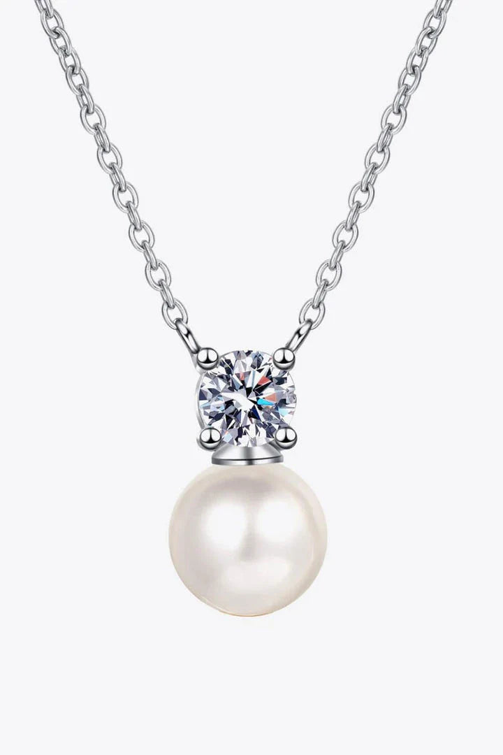 925 sterling silver necklace featuring freshwater pearls and a moissanite centre stone, a stunning piece of British-inspired jewellery