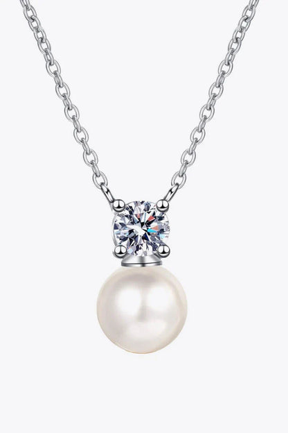 925 sterling silver necklace featuring freshwater pearls and a moissanite centre stone, a stunning piece of British-inspired jewellery