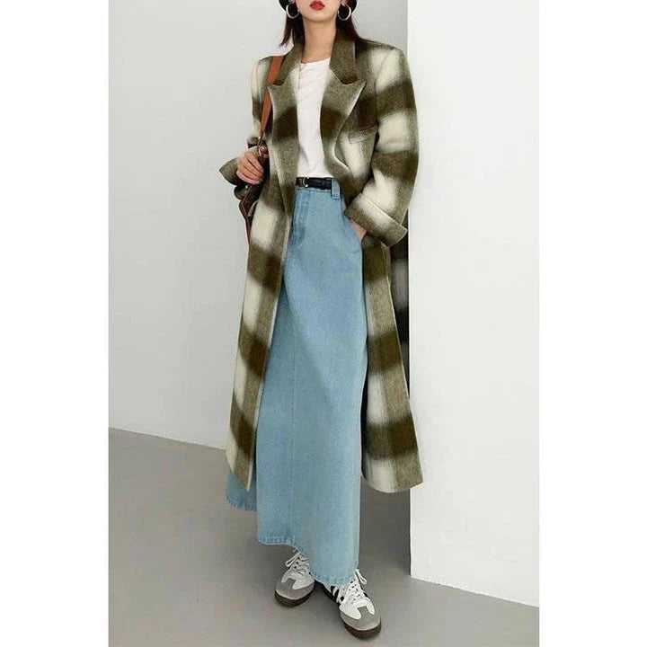 Elegant plaid double-breasted long woollen coat for women, featuring a premium blend of wool, cotton and polyester for exceptional quality and warmth.