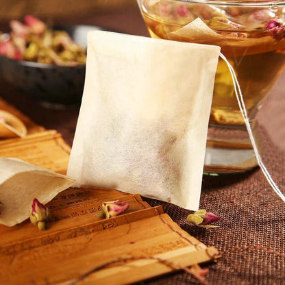 Disposable paper tea bags in various sizes, made with premium non-woven fabric for superior infusion and convenient, on-the-go enjoyment.