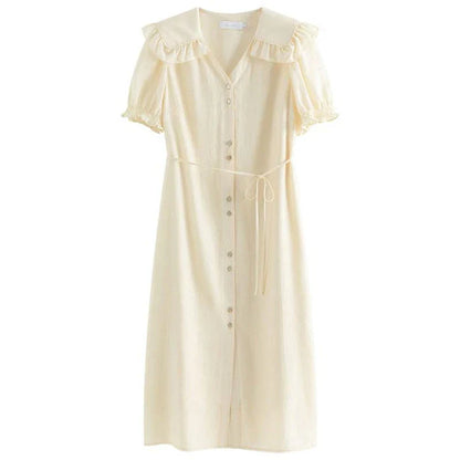 Elegant navy blue sailor collar dress with delicate fungus-edged sleeves, versatile and stylish for summer events