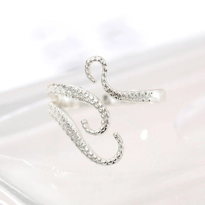 Elegant adjustable wrap ring with a detailed octopus tentacle design, made from durable stainless steel.