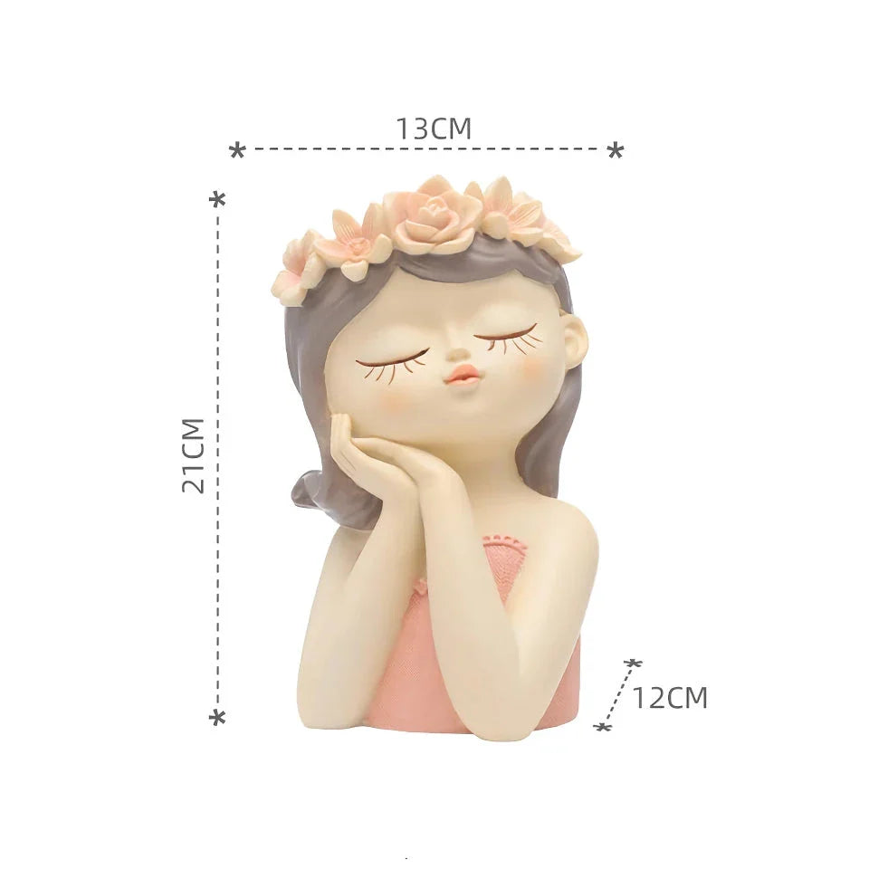 A charming 7.8-inch resin planter in the shape of a fairy girl, perfect for displaying succulents and adding whimsical decor to your home or office.