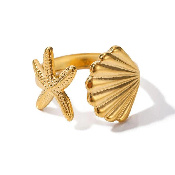 Adjustable stainless steel ring with starfish and shell accents, perfect for beach and casual wear