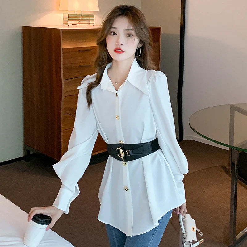 Elegant long sleeve blouse with metal buckle and removable belt in white and black colours