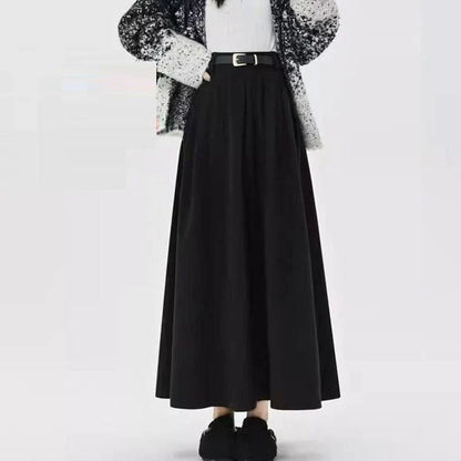 Elegant high-waisted pleated maxi skirt for stylish British women, featuring a classic A-line silhouette and solid colour design