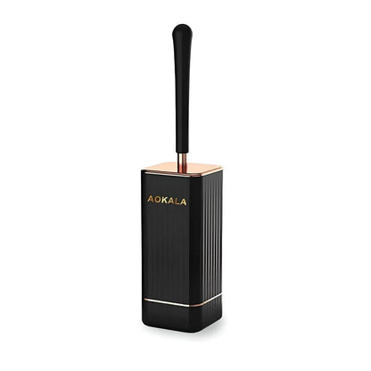 Elegant silicone toilet brush and holder set in black and white with rose gold accents, designed for modern bathroom cleaning