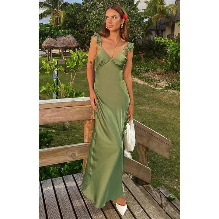 Elegant sleeveless ruffle maxi dress in green with backless design, made of premium silk and polyester blend