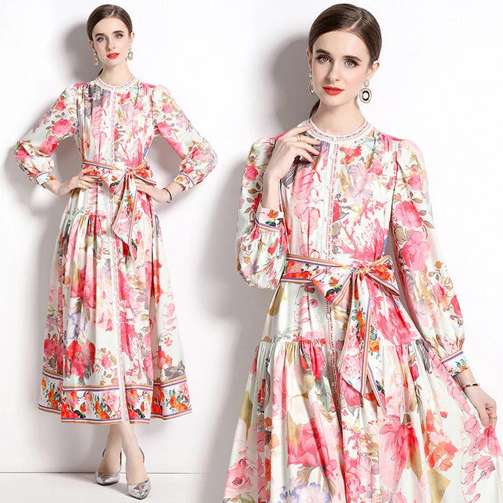 Elegant floral single-breasted swing dress with delicate print, tailored design, and flowing silhouette