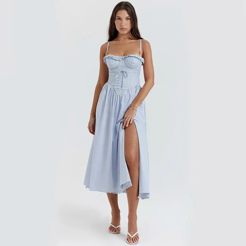 Blue midi crochet dress with spaghetti straps, bustier design, and floral crochet pattern