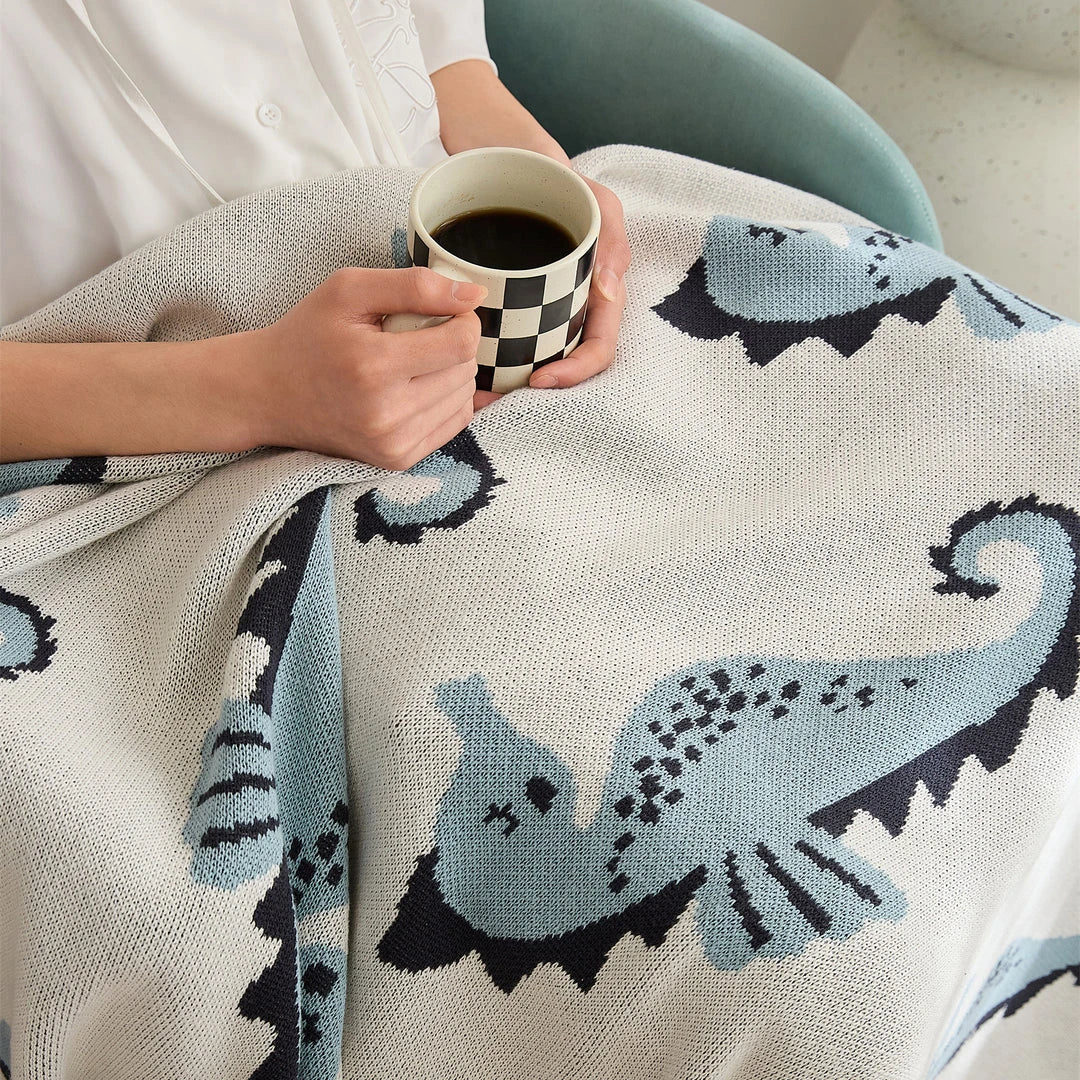 Cosy Sea Horse Cotton Throw Blanket in pink and lake blue colours, featuring a playful sea horse pattern and jacquard weave design.