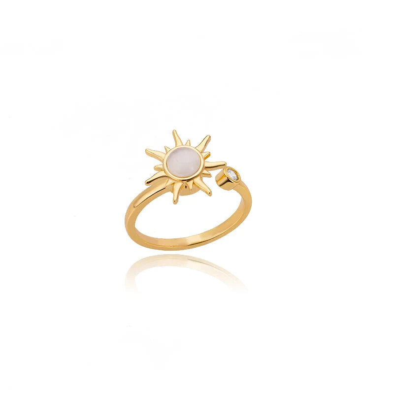 Adjustable stainless steel ring with rotating sun opal centerpiece, offering a modern and sophisticated geometric design for fashionable women