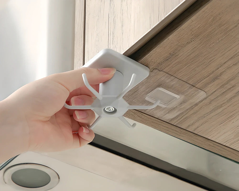 Rotating Stick-On Cabinet Utensil Organiser in Black and Light Grey colours, with 6 hooks for storing cooking utensils