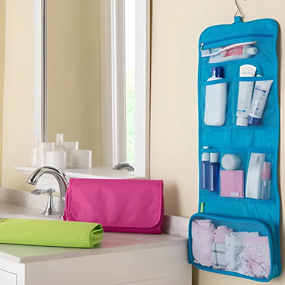A compact, foldable travel toiletry organiser made of durable polyester with multiple compartments for organising cosmetics, makeup, and bathroom essentials.