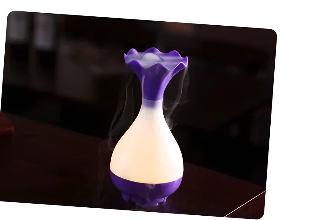 Elegant ultrasonic aroma diffuser and humidifier in various colours, creating a soothing and relaxing atmosphere.