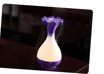 Elegant ultrasonic aroma diffuser and humidifier in various colours, creating a soothing and relaxing atmosphere.